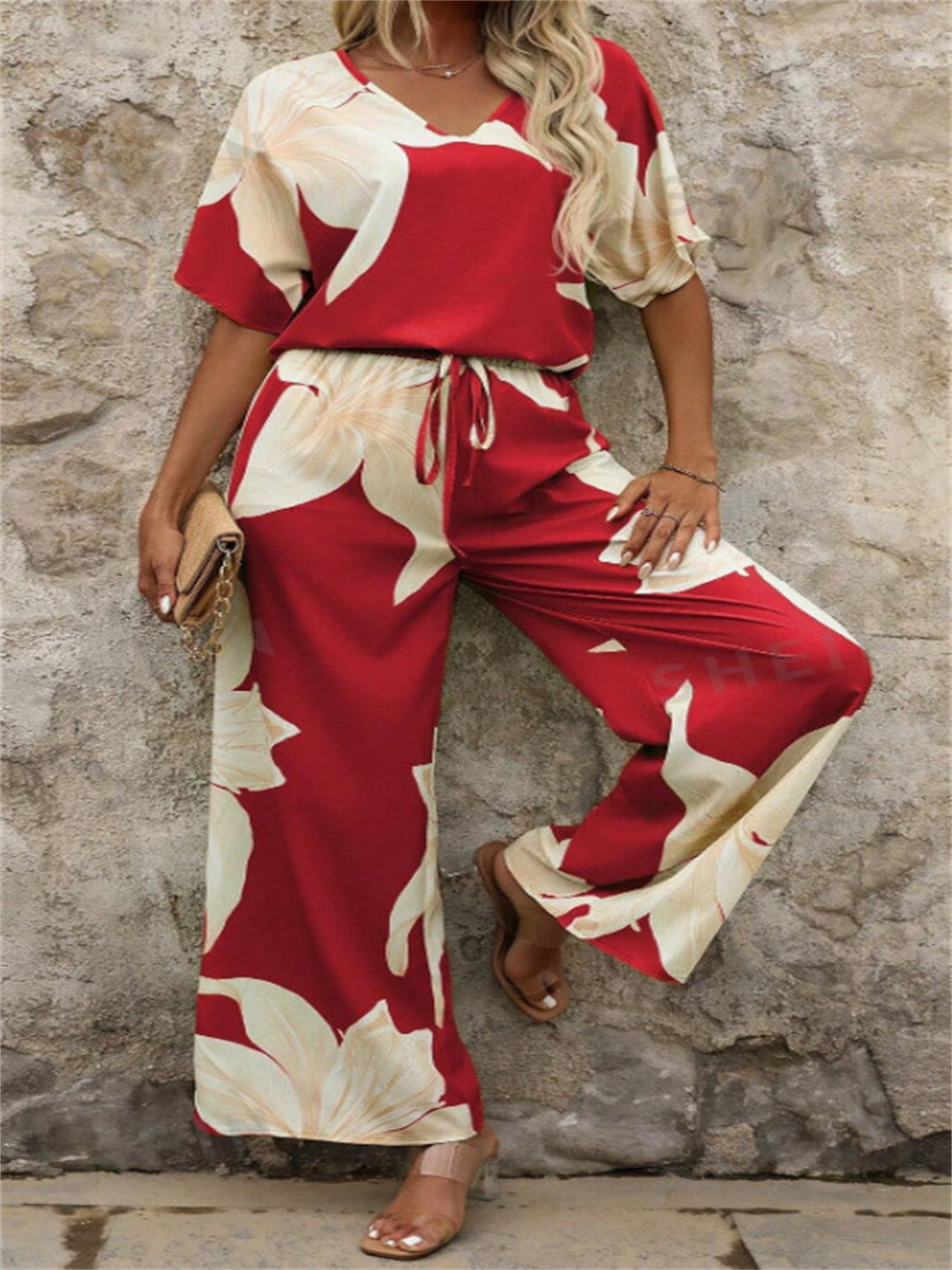 Damen Eleganter Jumpsuit mit floralen Mustern und weitem Bein