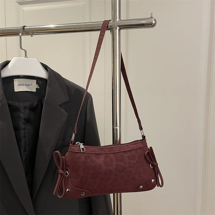 Damen Umhängetasche mit Leopardenmuster und dekorativen Schleifendetails Nord Taschen
