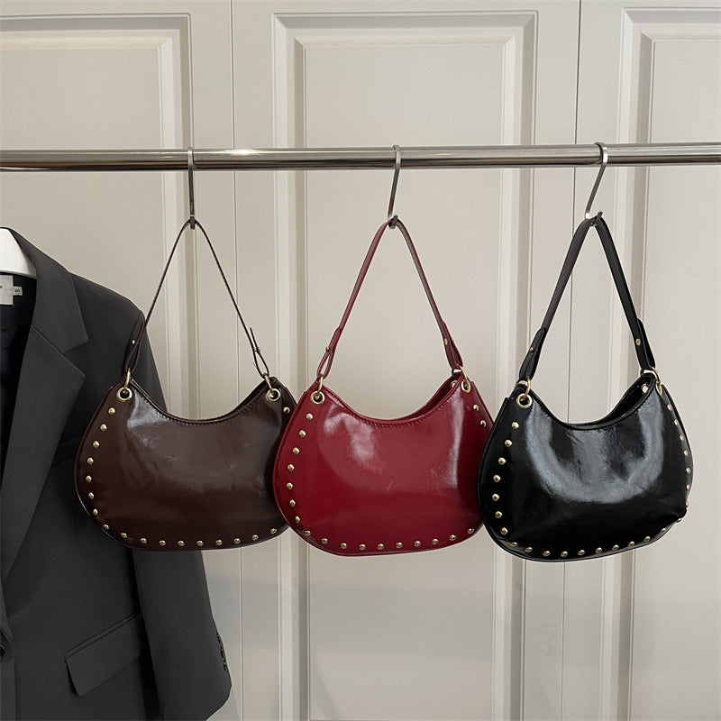 Damen elegante Schultertasche mit goldenen Nieten Nord Taschen