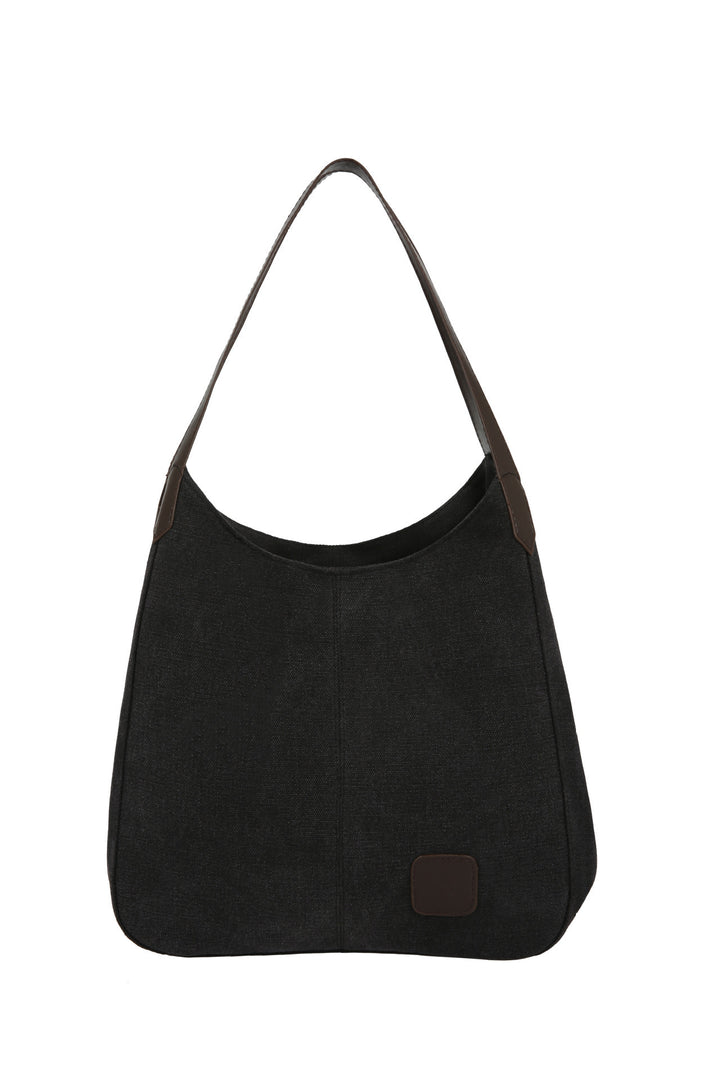 Damen Schultertasche aus strapazierfähigem Canvas mit eleganten Lederakzenten Nord Taschen