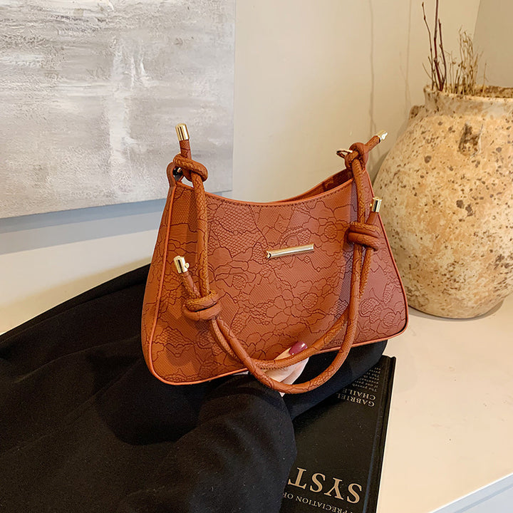 Damen Designer Handtasche mit floralem Relief Nord Taschen