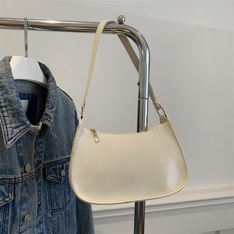 Damen elegante Umhängetasche aus veganem Leder mit minimalistischer Form Nord Taschen