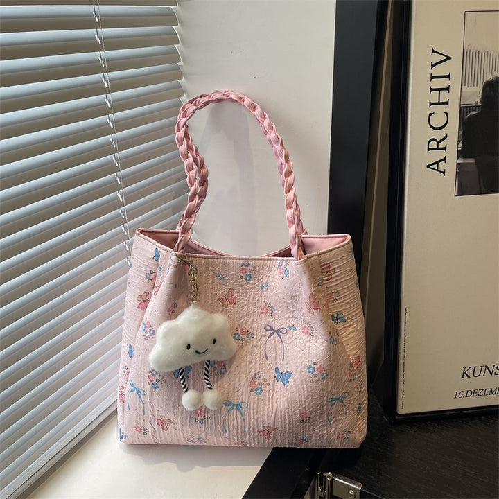 Damen modische Handtasche mit blumigem Design und verspieltem Anhänger Nord Taschen