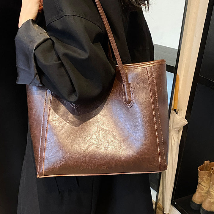 Damen Tragetasche mit elegantem strukturierter Oberfläche und praktischen Innenfächern Nord Taschen