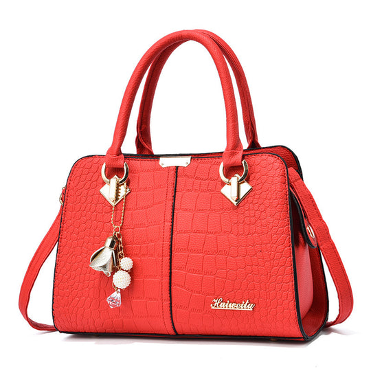 Damen elegante Handtasche mit Krokodil-Prägung und detaillierten Anhängern Nord Taschen
