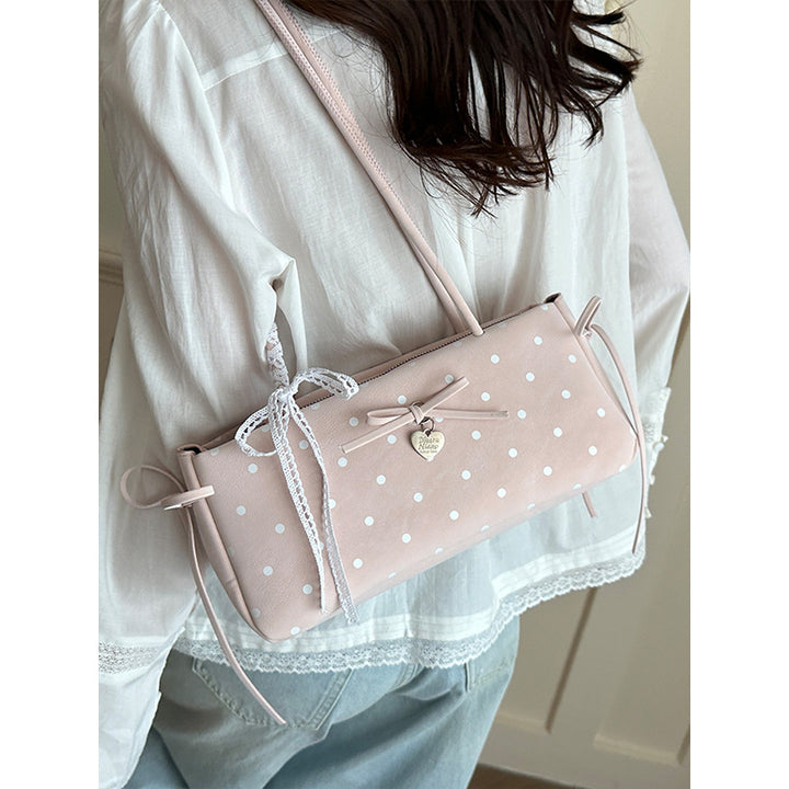 Damen Handtasche mit spielerischem Punktemuster und eleganten Details Nord Taschen