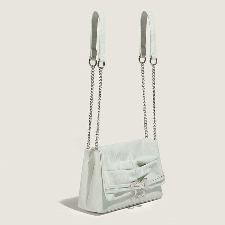 Damen Umhängetasche mit verspieltem Schmetterlingsdesign und eleganter Faltenoptik Nord Taschen