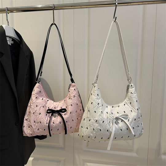 Damen modische Schultertasche mit schimmernder Oberfläche und dekorativen Details Nord Taschen