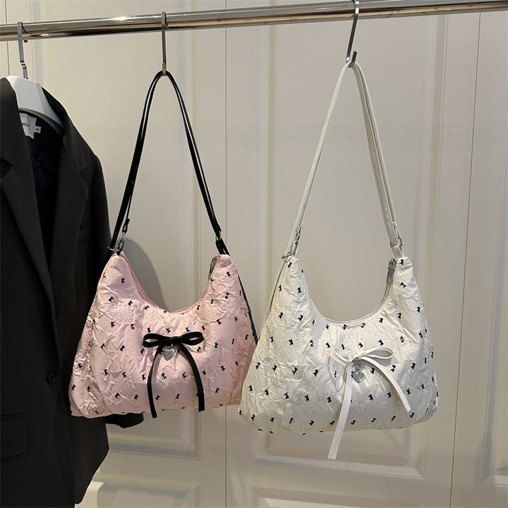 Damen modische Schultertasche mit schimmernder Oberfläche und dekorativen Details Nord Taschen