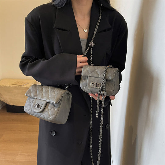 Damen Mini-Handtasche mit gepolstertem Design und elegantem Kettenriemen Nord Taschen