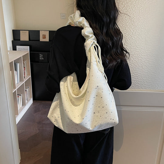 Damen Hobo-Tasche mit schimmerndem Sternenmotiv und strukturiertem Design Nord Taschen