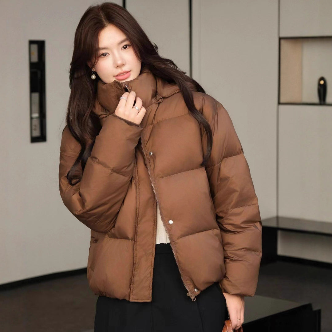Damen Kurz geschnittene Oversize-Steppjacke mit XXL-Kapuze und thermischer Isolierung Nord Taschen