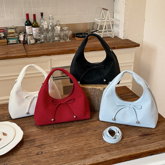 Damen modische Umhängetasche mit kreativem Kordelzug und rundem Griff Nord Taschen