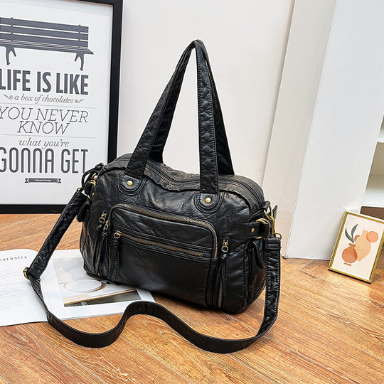 Damen Handtasche mit strukturiertem Design und dekorativen Metallakzenten Nord Taschen