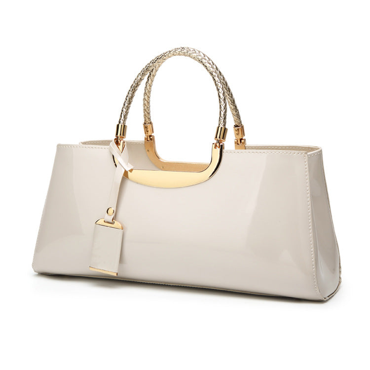 Damen edle Glanz-Handtasche mit geflochtenem Tragegriff Nord Taschen
