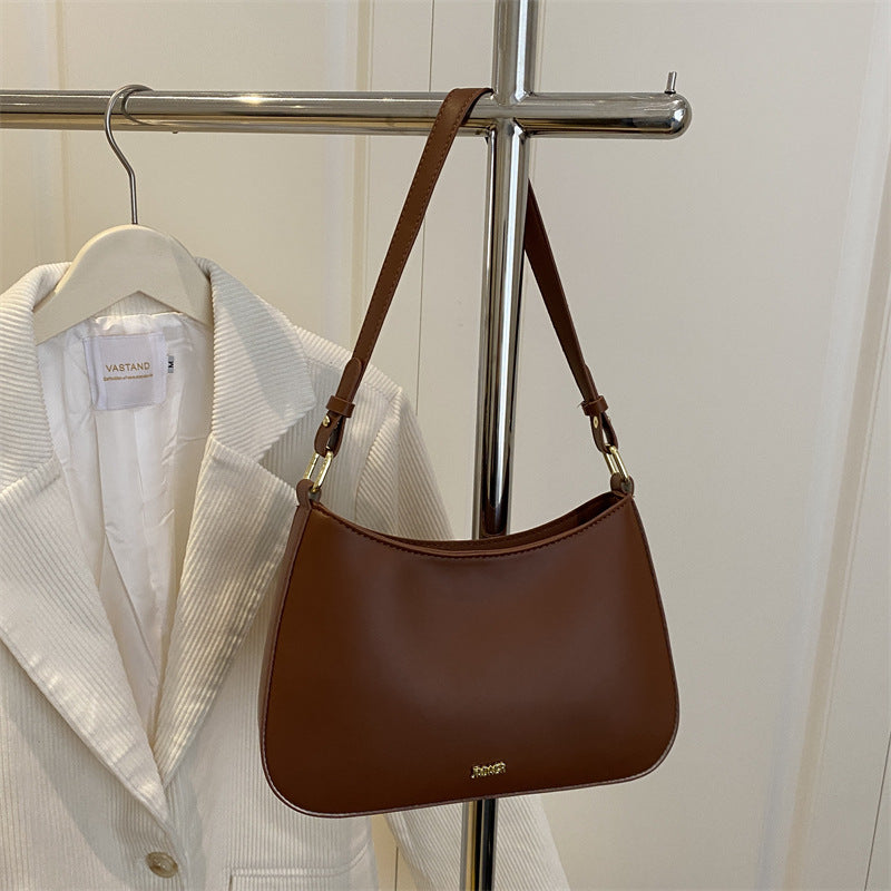 Damen elegante Umhängetasche mit geschwungenem Design und abnehmbarem Riemen Nord Taschen