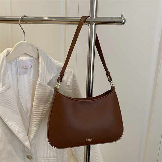 Damen elegante Umhängetasche mit geschwungenem Design und abnehmbarem Riemen Nord Taschen