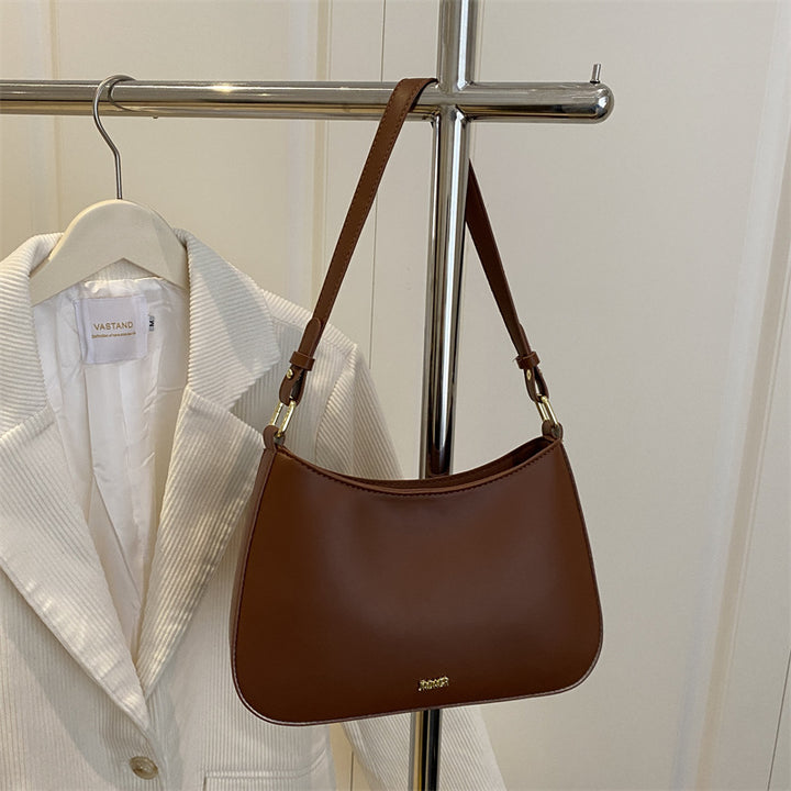 Damen elegante Umhängetasche mit geschwungenem Design und abnehmbarem Riemen Nord Taschen