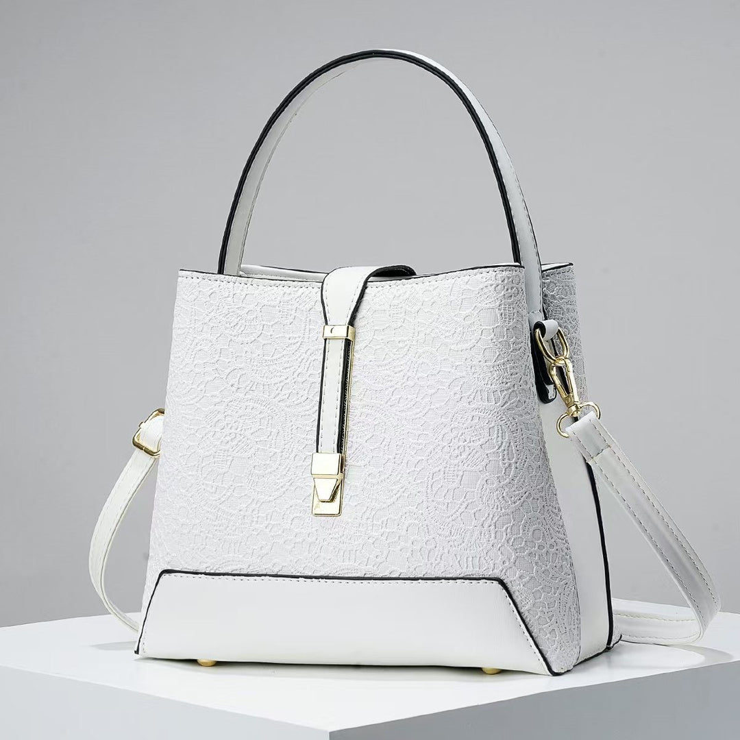 Damen elegante Handtasche mit filigranem Spitzenmuster Nord Taschen