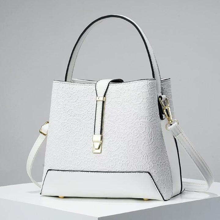 Damen elegante Handtasche mit filigranem Spitzenmuster Nord Taschen