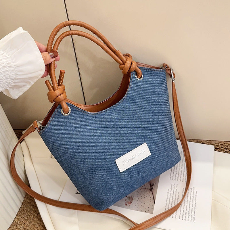 Damen Handtasche aus strapazierfähigem Denim mit eleganten Lederdetails Nord Taschen