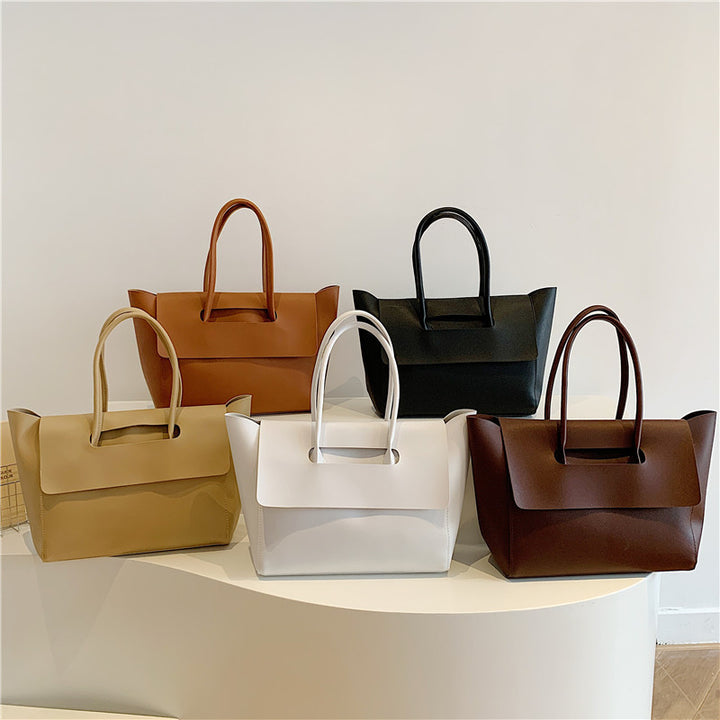 Damen Designer Handtasche mit modernem Klappverschluss Nord Taschen