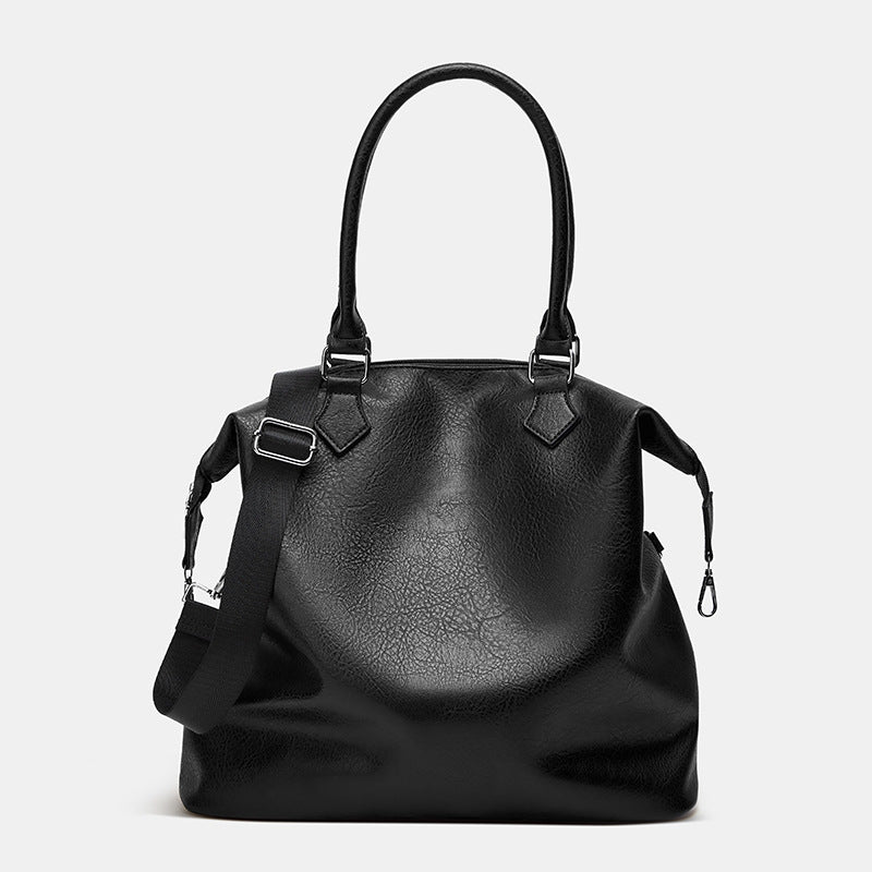 Damen Handtasche mit verstellbarem Schulterriemen und eleganter Lederstruktur Nord Taschen