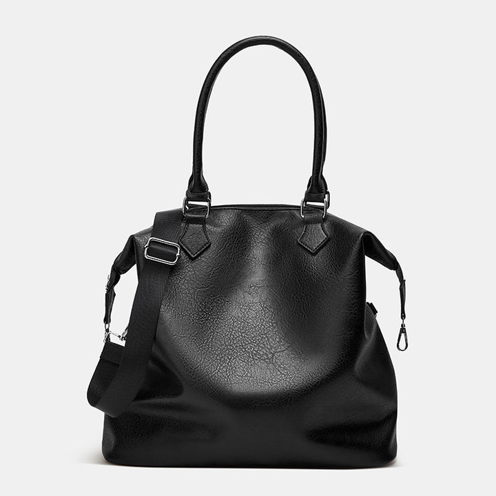 Damen Handtasche mit verstellbarem Schulterriemen und eleganter Lederstruktur Nord Taschen
