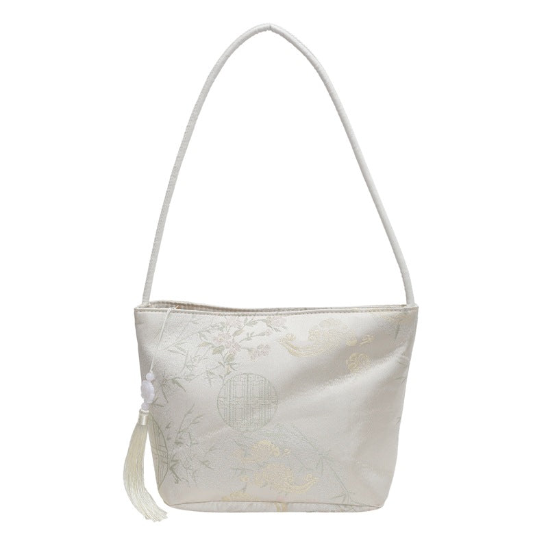 Damen modische Abendtasche aus luxuriösem Material mit dekorativem Quastenanhänger Nord Taschen