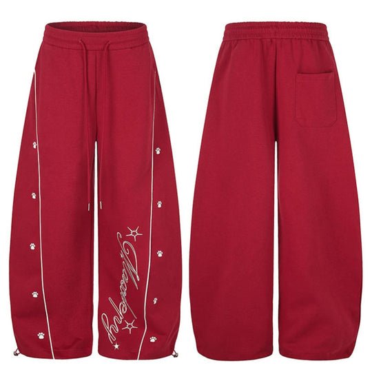 Damen Lockerfallende Palazzo‑Sweathose im Athleisure‑Look mit Tunnelzugbund und Script‑Print Nord Taschen