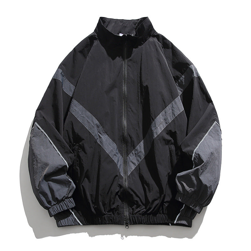 [Unisex] Oversize technische Wind- und Regenjacke mit Stehkragen, reflektierenden Paspeln und elastischem Saum Nord Taschen