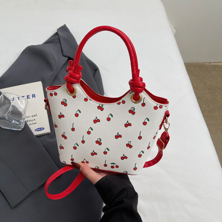 Damen Handtasche mit charmantem Kirschdesign und eleganten Details Nord Taschen