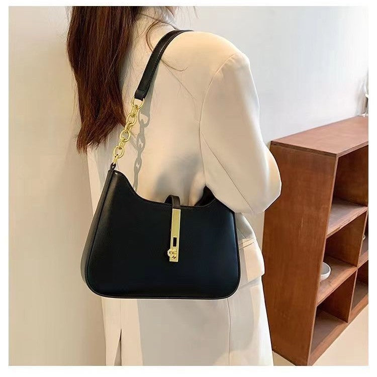 Damen Schultertasche mit goldfarbener Schnallenakzent und vielseitigem Design Nord Taschen