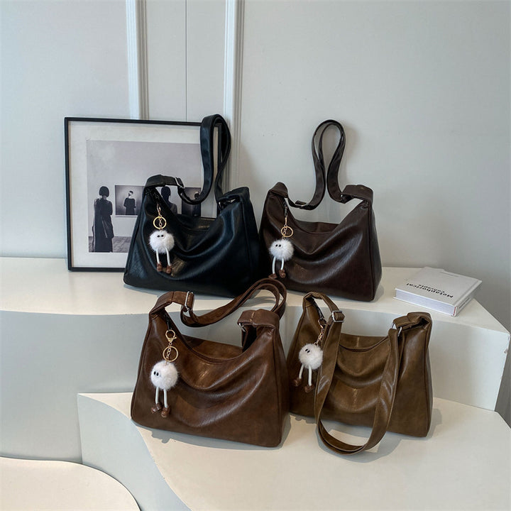 Damen Handtasche mit verspieltem Schlüsselanhänger Nord Taschen