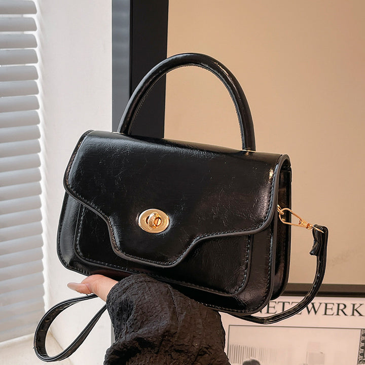 Damen Handtasche mit hochwertigem Kunstleder und elegantem Klappenverschluss Nord Taschen