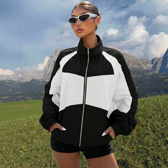 Damen Leichte Windbreaker‑Jacke mit hohem Stehkragen und Colorblock‑Design Nord Taschen