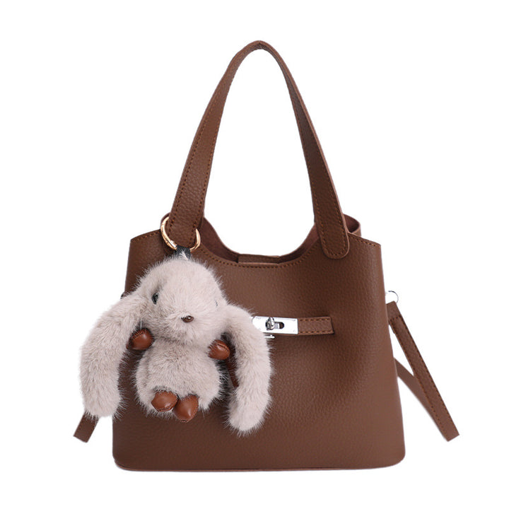 Damen Handtasche im modernen Design mit einzigartigem Plüschanhänger Nord Taschen