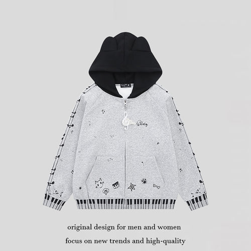 Damen Kapuzensweatjacke mit durchgehendem Reißverschluss, Musikprint, Klaviertasten‑Bündchen und Ohrenkapuze Nord Taschen