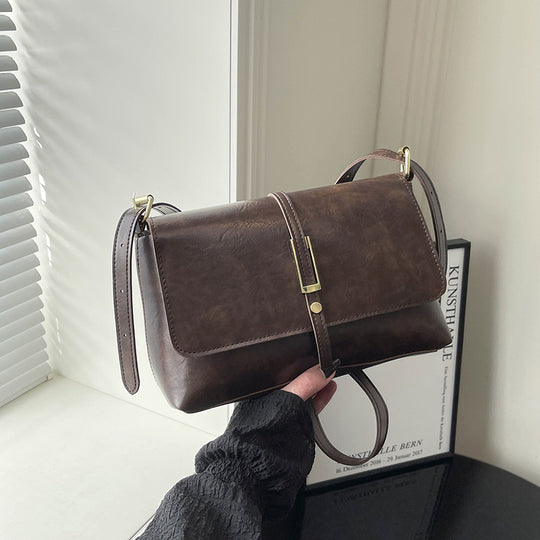 Damen elegante Umhängetasche aus hochwertigem Kunstleder mit zuverlässigem Klappverschluss Nord Taschen