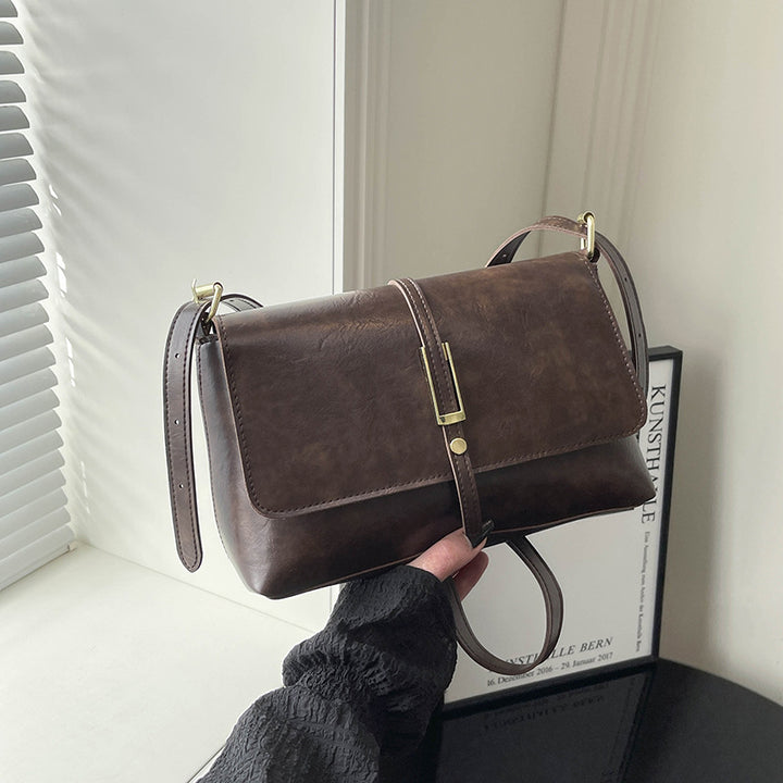 Damen elegante Umhängetasche aus hochwertigem Kunstleder mit zuverlässigem Klappverschluss Nord Taschen