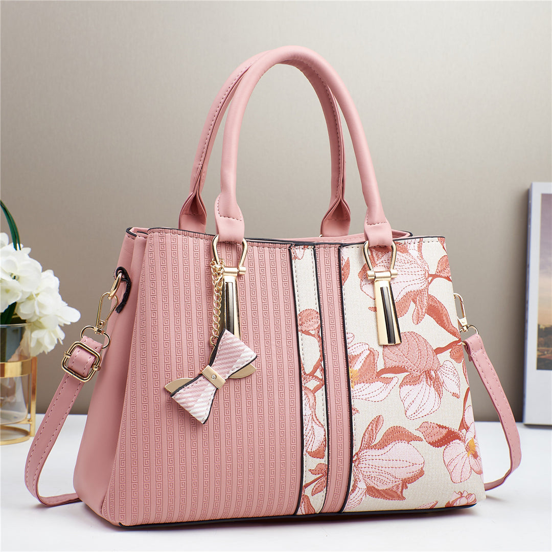Damen elegante Handtasche mit floralen Akzenten Nord Taschen