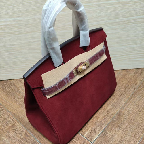 Damen Handtasche aus feinstem Wildleder mit goldfarbenem Verschluss Nord Taschen
