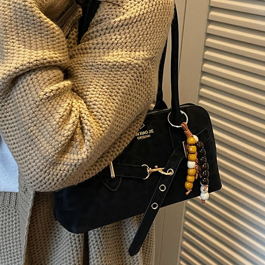 Damen Umhängetasche aus weichem Kunstleder mit kreativen Dekorelementen Nord Taschen