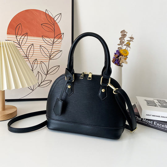 Damen elegante Handtasche mit strukturiertem Kunstleder und modischen Akzenten Nord Taschen