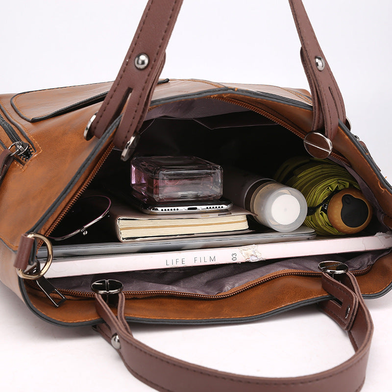 Damen modische Handtasche mit strukturiertem Kunstleder und praktischen Außentaschen Nord Taschen