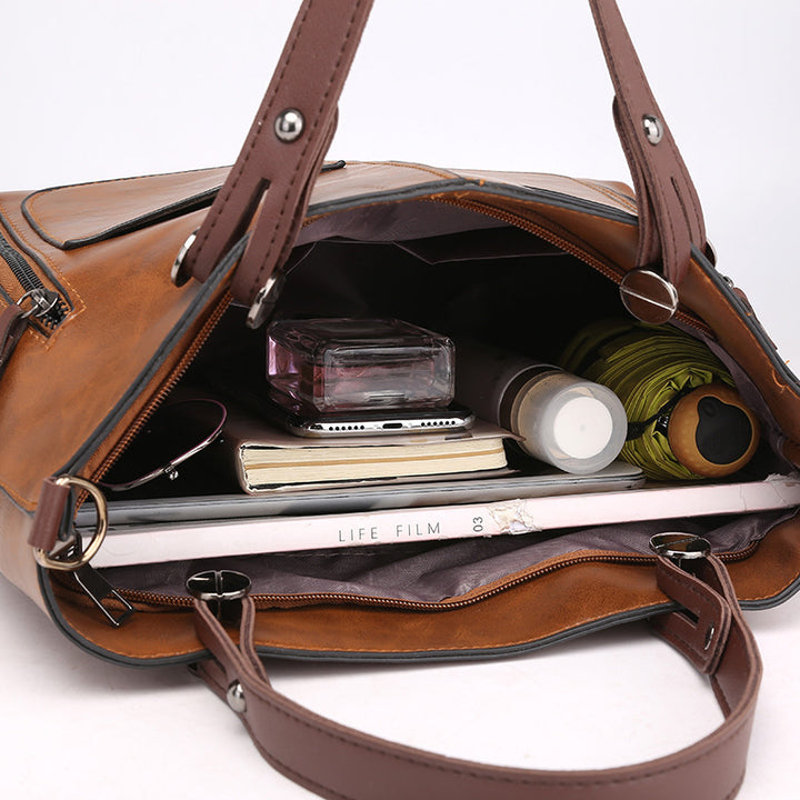 Damen modische Handtasche mit strukturiertem Kunstleder und praktischen Außentaschen Nord Taschen
