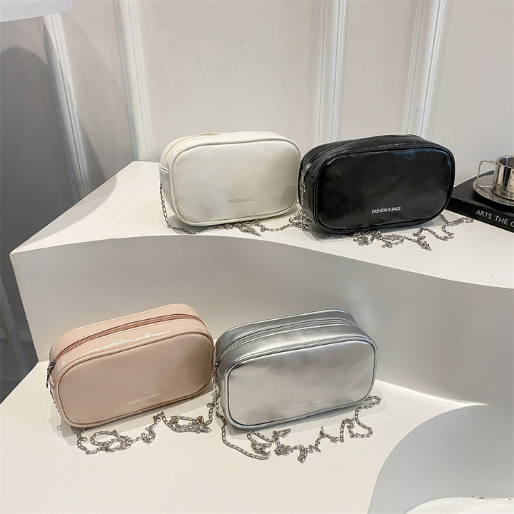 Damen elegante Handtasche mit glänzender Oberfläche und feinem Reißverschluss Nord Taschen