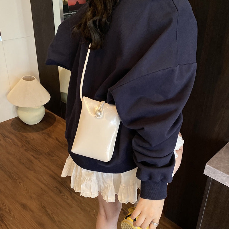 Damen elegante Clutch mit Perlenakzent Nord Taschen