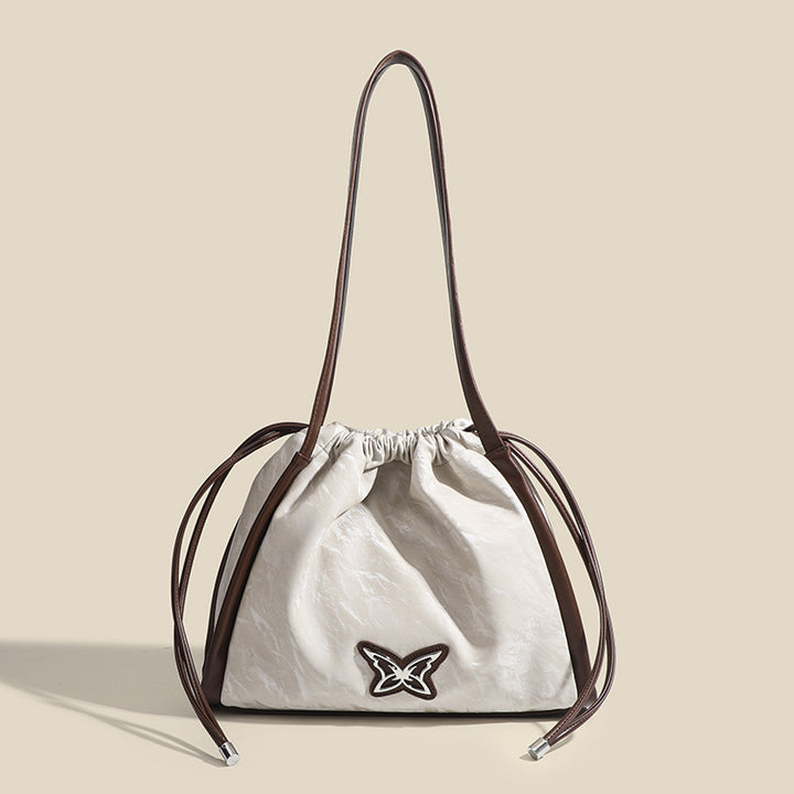 Damen Beuteltasche mit eleganter Kordelzug-Optik und einzigartigem Schmetterlingsmotiv Nord Taschen