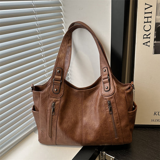 Damen geräumige Handtasche aus hochwertigem Kunstleder mit praktischen Außentaschen Nord Taschen